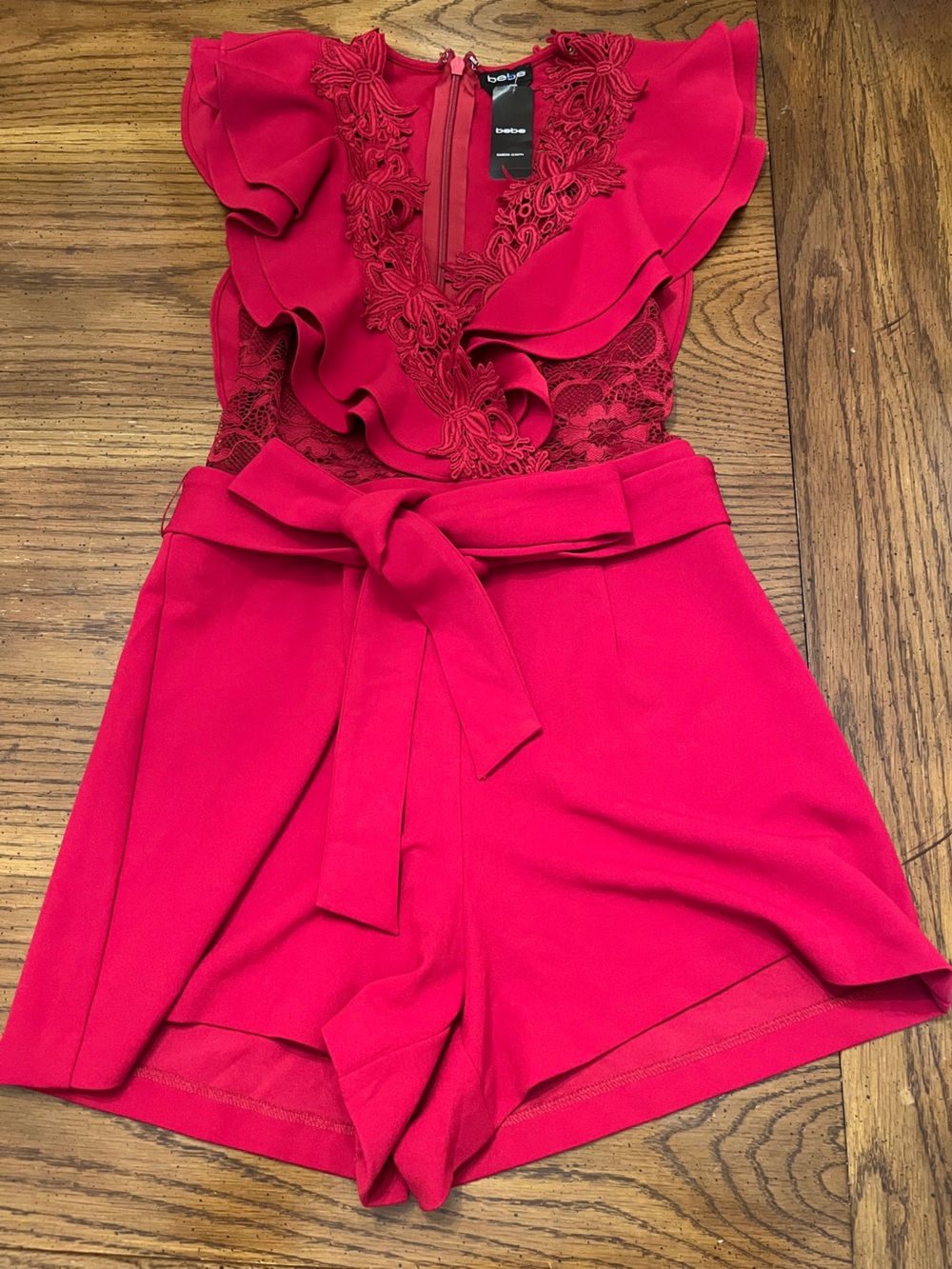 bebe Women's Flowy Cascade Lace Romper, size medium, new with tags